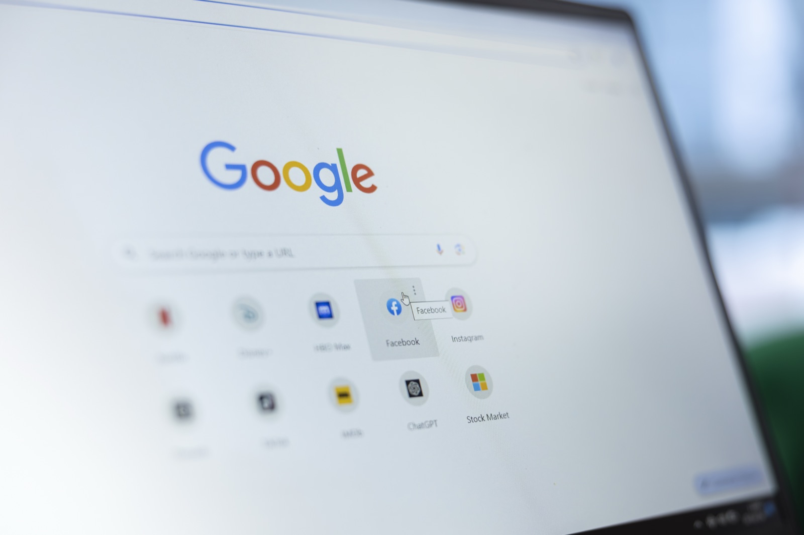 Laptop screen showing the Google homepage — illustration for the post 'How to show up in Gemini in 2026'.